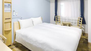 Desk, laptop workspace, free WiFi, bed sheets