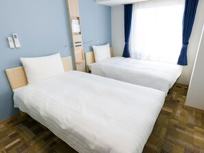 Desk, laptop workspace, free WiFi, bed sheets