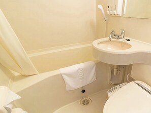 Combined shower/bathtub, free toiletries, hair dryer, bathrobes