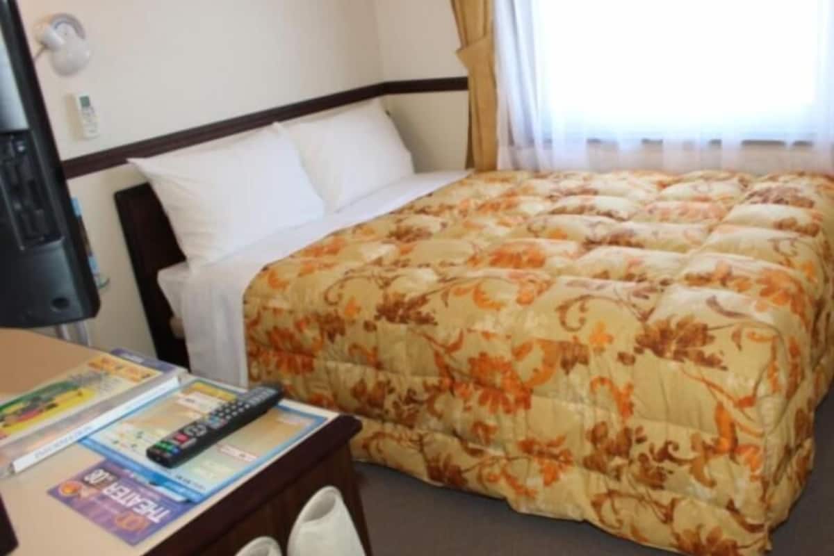 Desk, laptop workspace, blackout drapes, WiFi