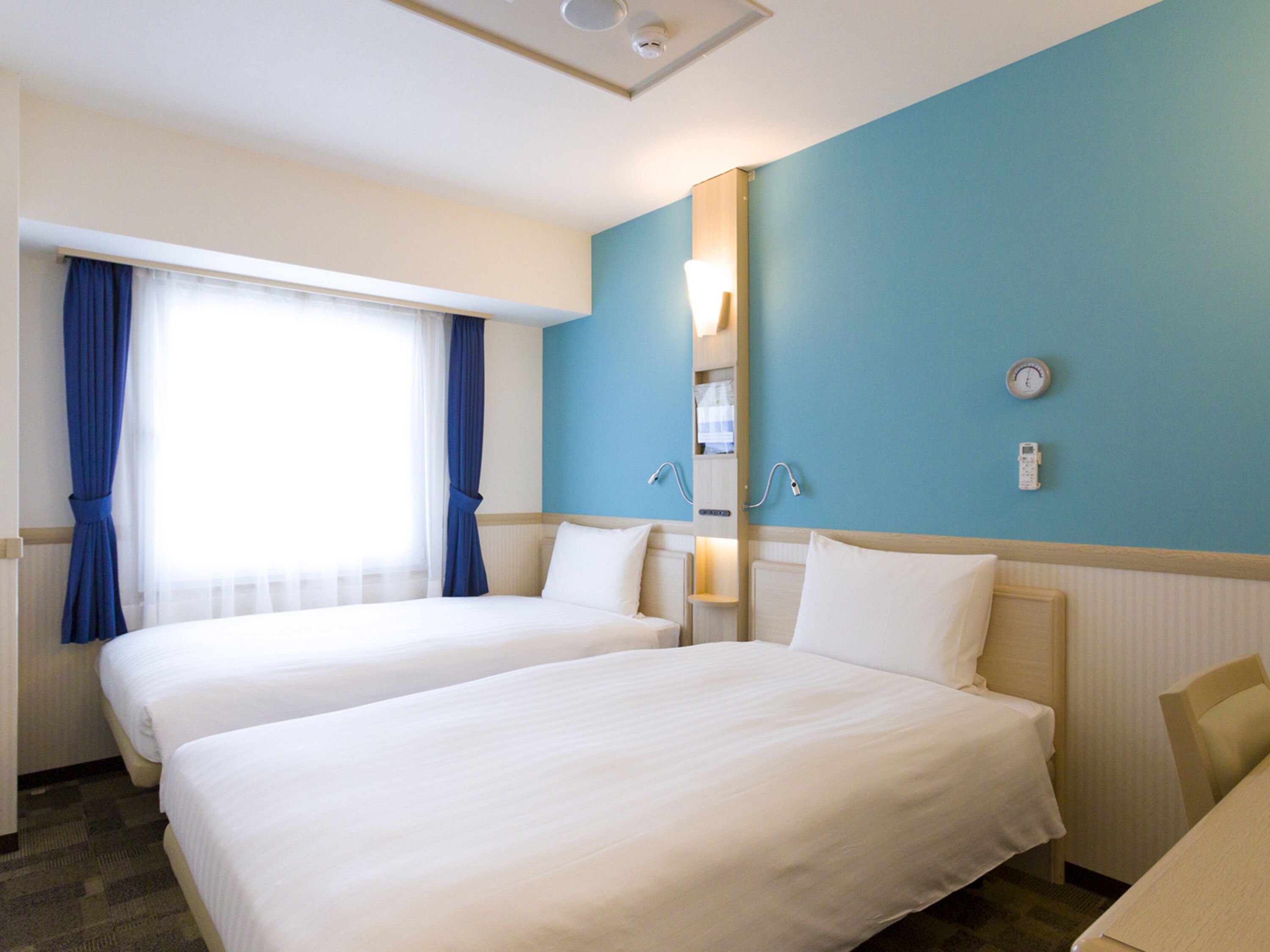 Desk, laptop workspace, free WiFi, bed sheets