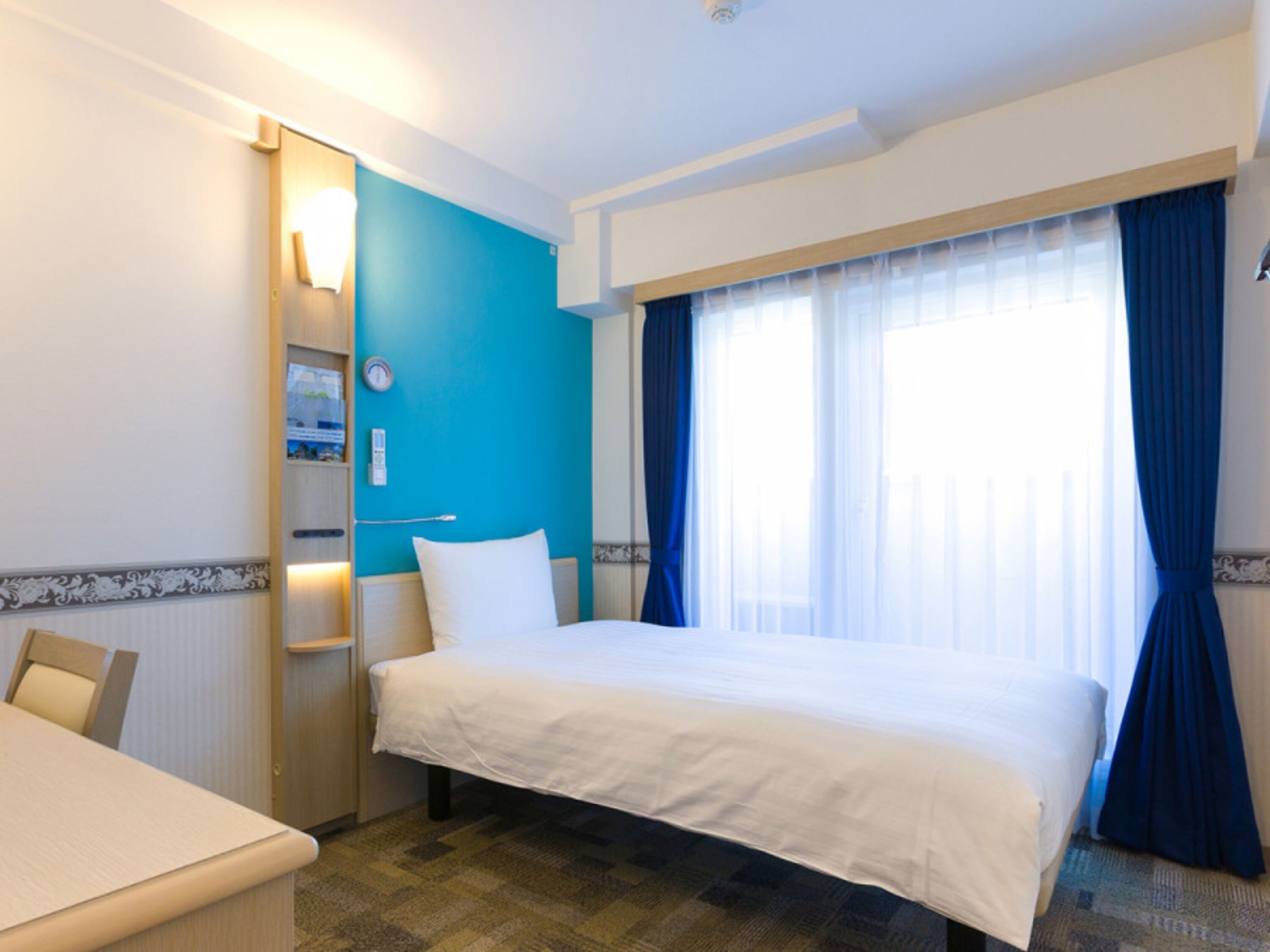 Desk, laptop workspace, free WiFi, bed sheets