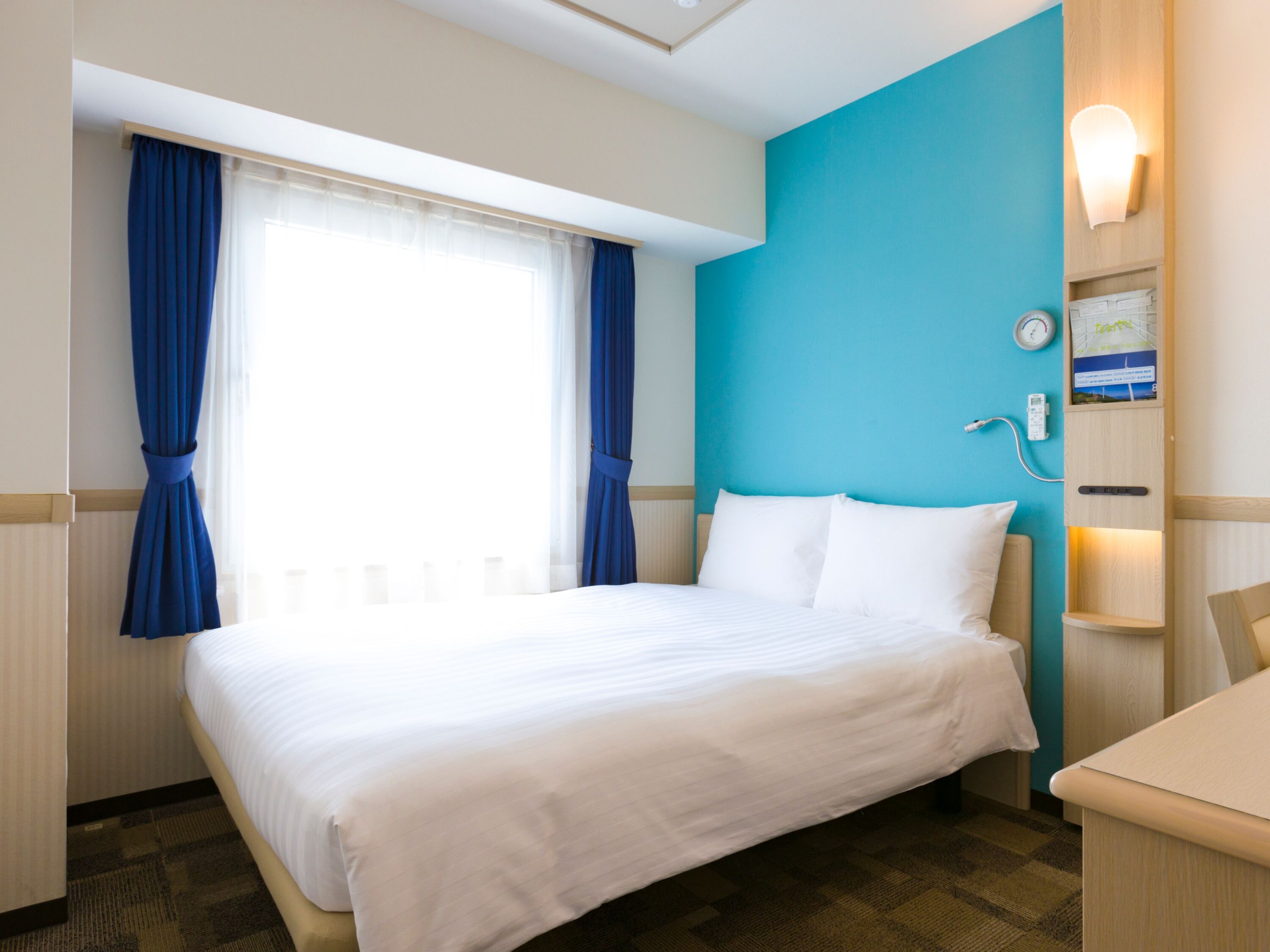 Desk, laptop workspace, free WiFi, bed sheets