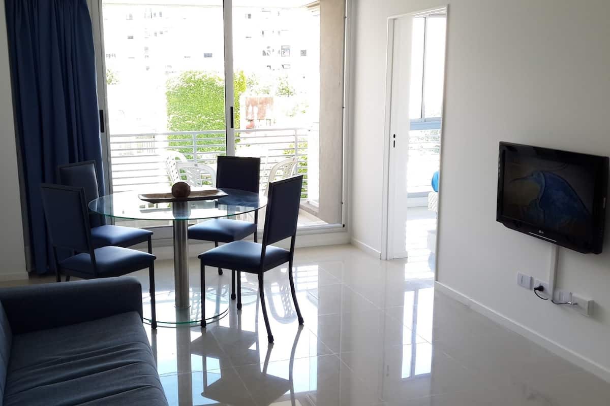 Superior Apartment, 1 Bedroom, 2 Bathrooms, Courtyard View | Living room | 32-inch LCD TV with cable channels, TV, DVD player