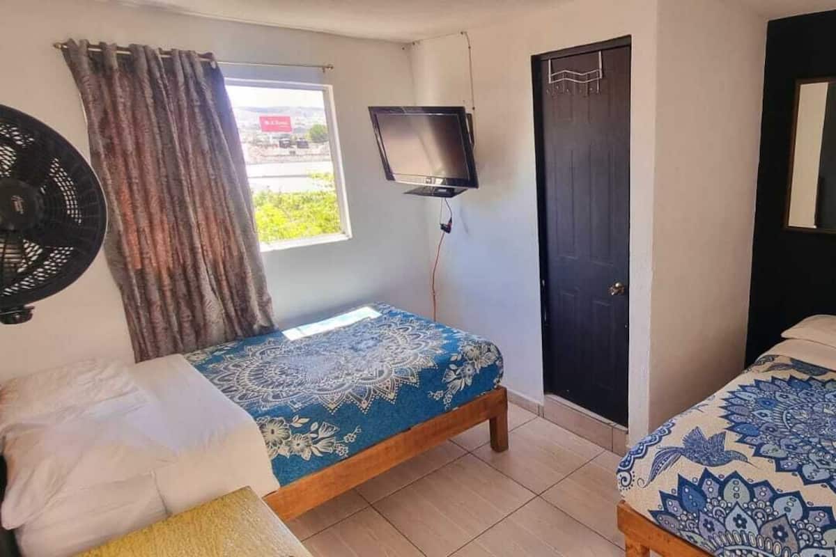 Deluxe tweepersoonskamer, 1 slaapkamer | 1 slaapkamer, een minibar, verduisterende gordijnen