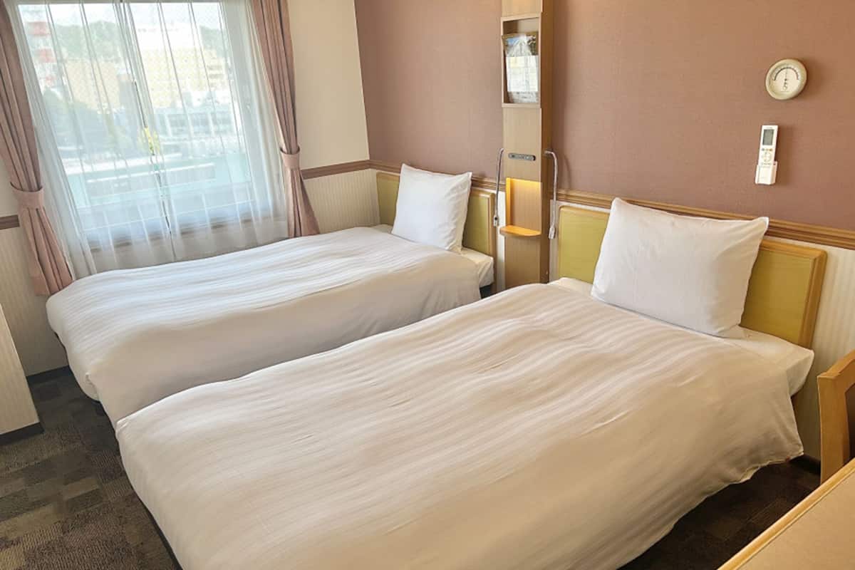 Premium bedding, desk, blackout drapes, iron/ironing board