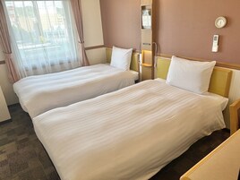 Premium bedding, desk, blackout drapes, iron/ironing board