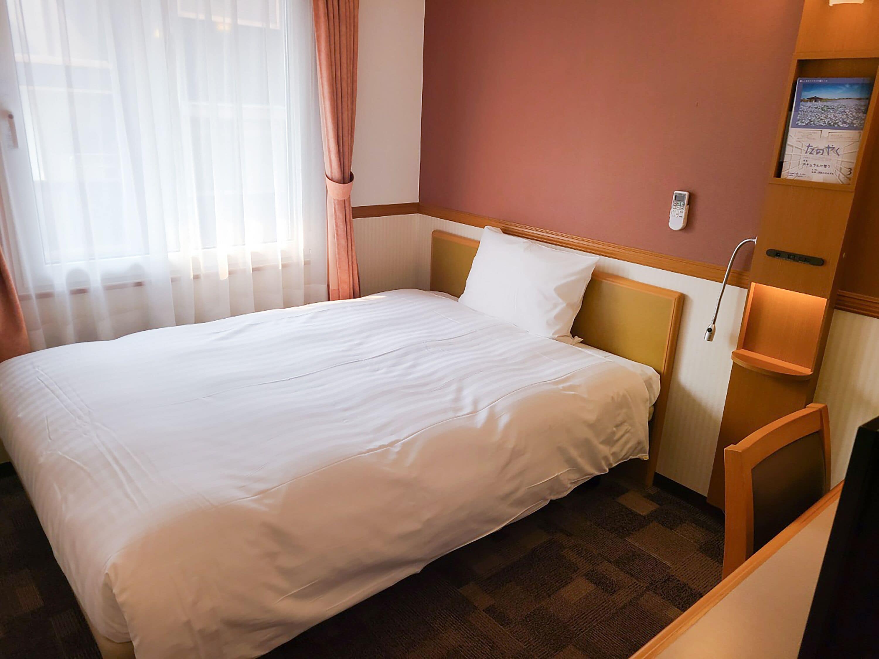 Desk, laptop workspace, blackout drapes, WiFi