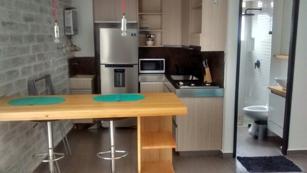 Studio | Private kitchen | Fridge, microwave, stovetop, coffee/tea maker