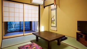 Japanese Style Townhouse | Living area | Flat-screen TV - Rinn Sanjusangendo (Kyoto)