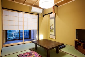 Japanese Style Townhouse | Living area | Flat-screen TV