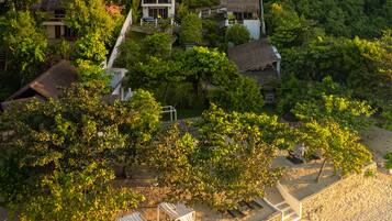 On the beach, sun-loungers, beach umbrellas, beach towels