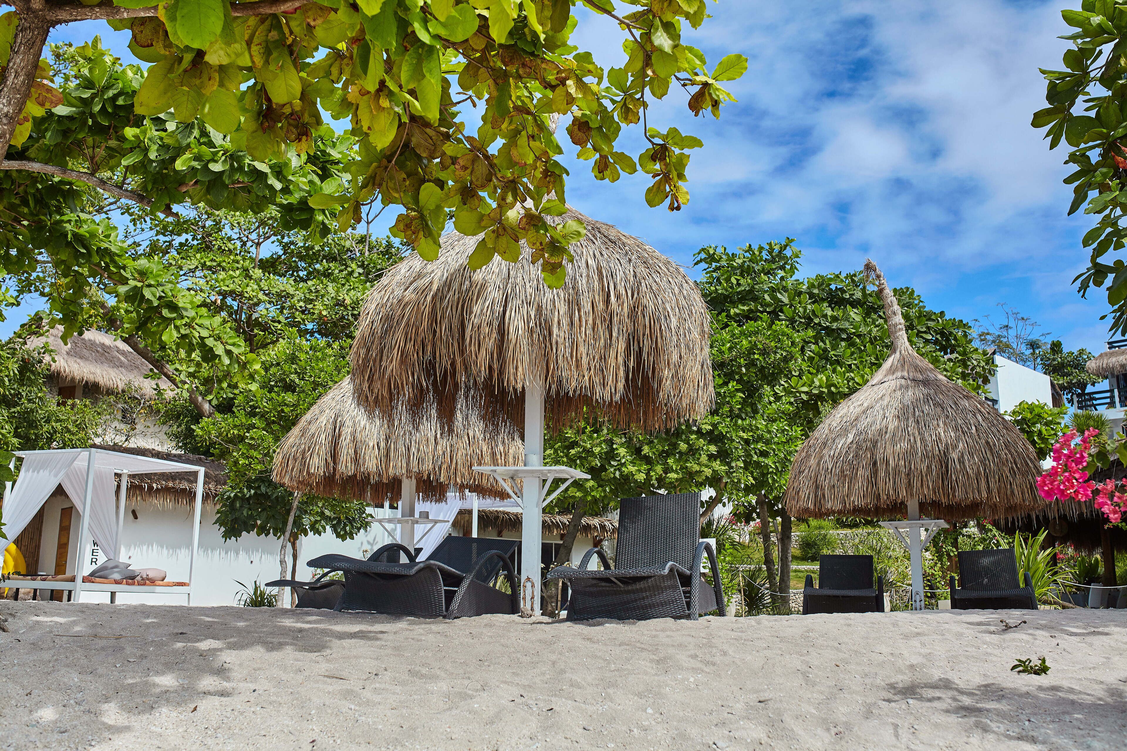 on the beach, sun-loungers, beach umbrellas, beach towels