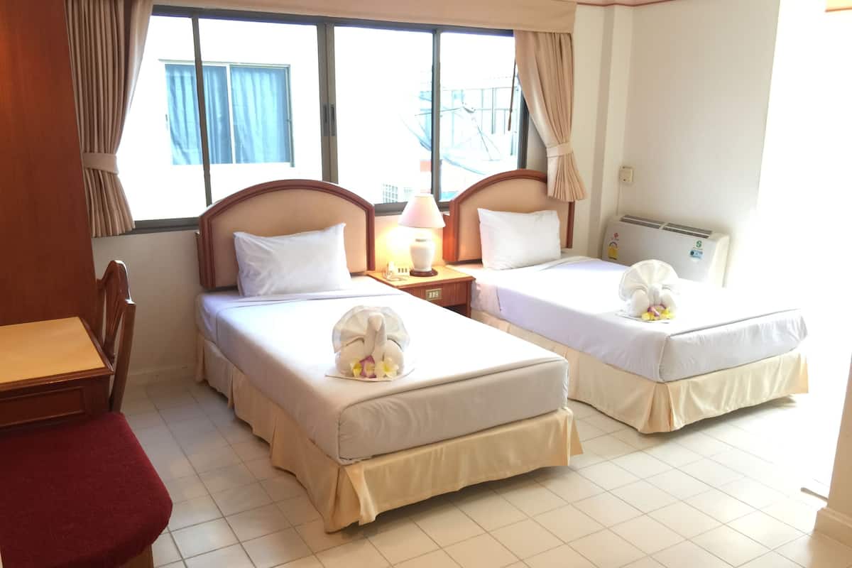 Deluxe Twin Room | Minibar, caja de seguridad en la habitación, escritorio y wifi gratis