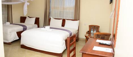Twin Room | Hypo-allergenic bedding, down duvets, memory-foam beds, desk