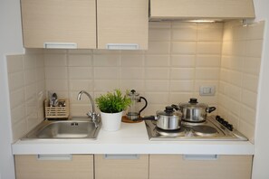 Fridge, cookware/dishes/utensils, dining tables - La Dolce Vita Residence (Maiori)