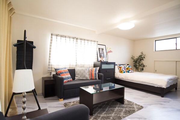 Casa de ciudad, 2 habitaciones, para no fumadores, vista a la ciudad | Área de sala de estar