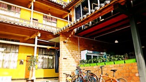 A multi-story building with balconies and a brick structure. - The Soul (Wenshan)