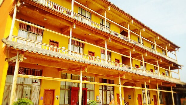 A multi-story building with balconies and a traditional architectural style. - The Soul (Wenshan)