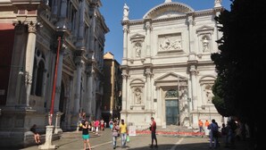 A historic building with classical architecture, including columns and statues. - San Rocco (Venice)