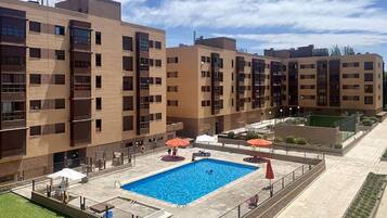 Indoor pool, outdoor pool, pool umbrellas, pool loungers