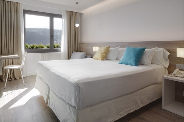 In-room safe, desk, blackout curtains, soundproofing