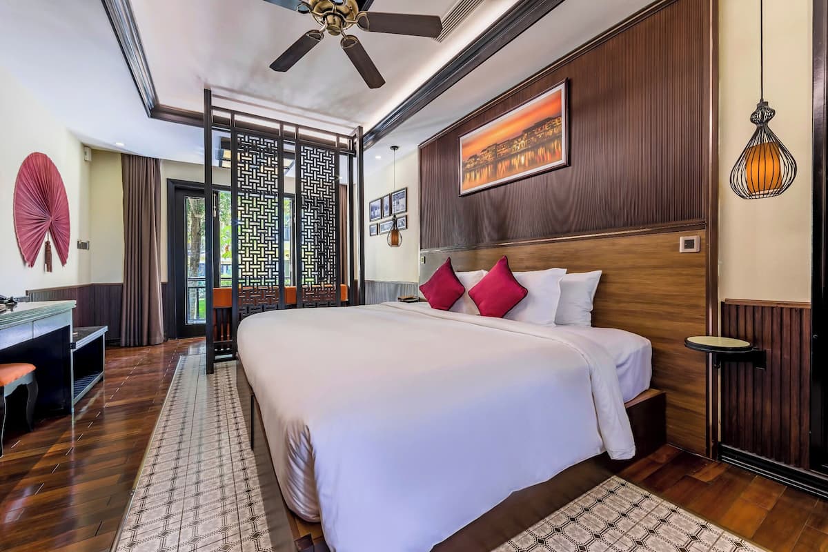 Bungalow, vue jardin | 4 chambres, minibar, coffres-forts dans les chambres, bureau