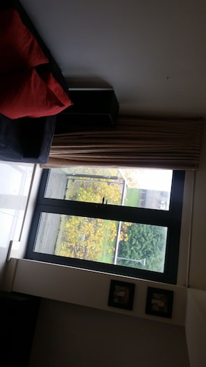 Apartment, 2 Bedrooms | Living room | Flat-screen TV
