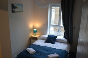 2 habitaciones, tabla de planchar con plancha y wifi gratis