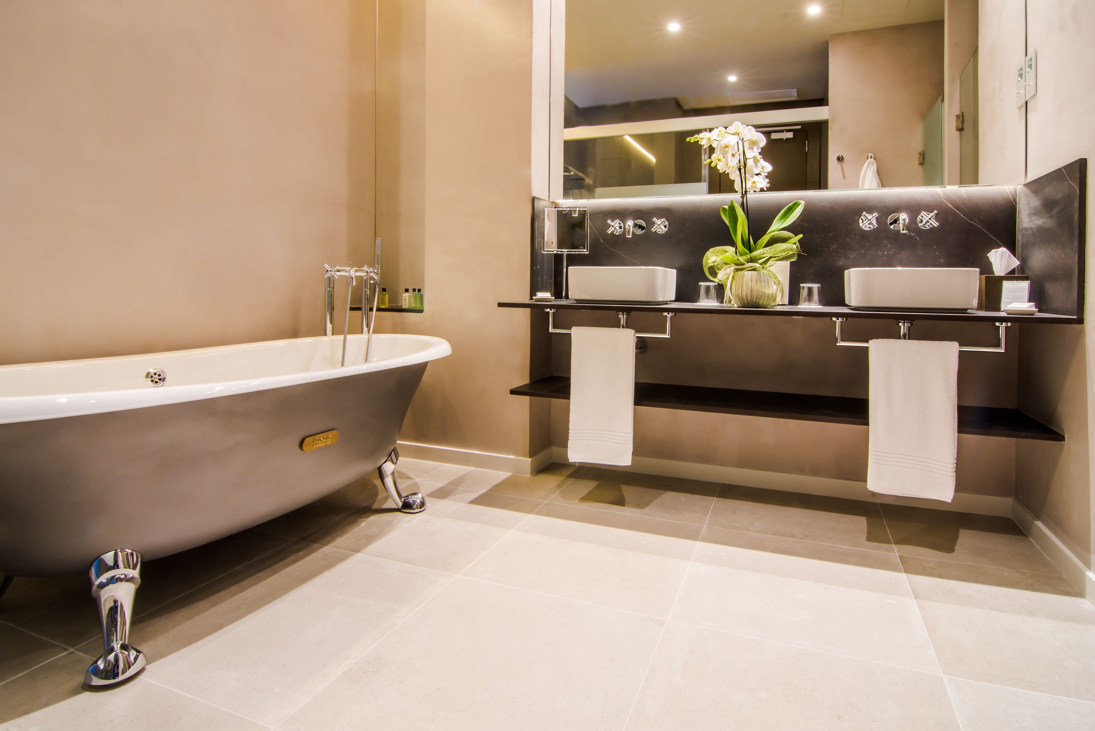 suite, terrace | bathroom | rainfall showerhead, designer toiletries, hair dryer, bathrobes