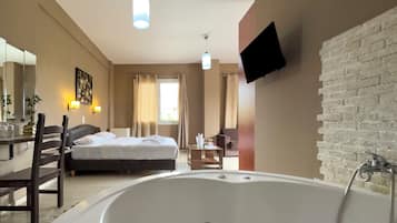 Suite, Hot Tub | In-room safe, soundproofing, iron/ironing board, WiFi