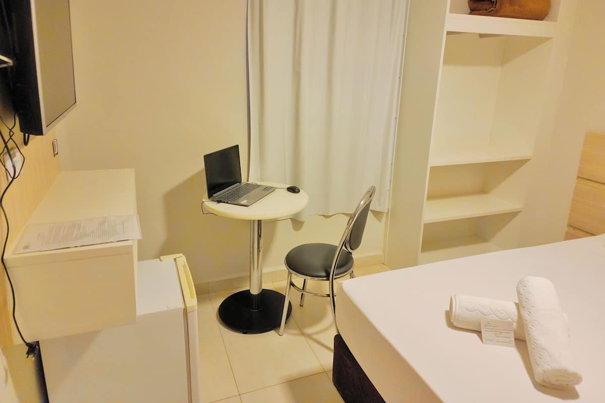 Executive Triple Room | 1 bedroom, premium bedding, minibar, blackout curtains