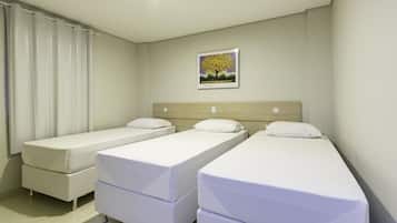 ห้องเอ็กเซกคิวทีฟทริปเปิล (Cama de Solteiro) | 1 ห้องนอน, เครื่องนอนระดับพรีเมียม, มินิบาร์, ผ้าม่านกันแสง