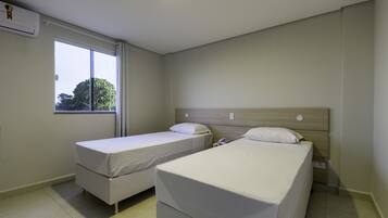 Quarto duplo executivo | 1 quarto, roupas de cama premium, frigobar, cortinas blackout