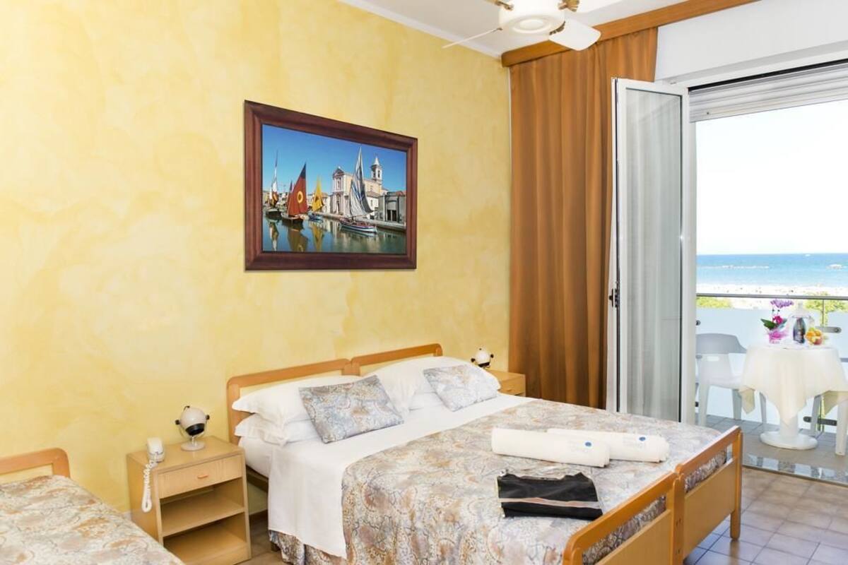 Standard Double or Twin Room, Balcony, Sea View | Minibar, in-room safe, desk, free cots/infant beds