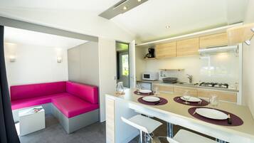 Premium Mobile Home (Perceval ) | Living room | Table football, ping pong, books