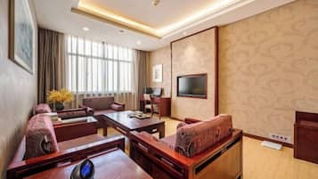 Minibar, coffres-forts dans les chambres, fer et planche Ă repasser