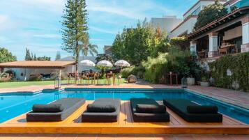 Outdoor pool, open 10:00 AM to 9:00 PM, sun loungers