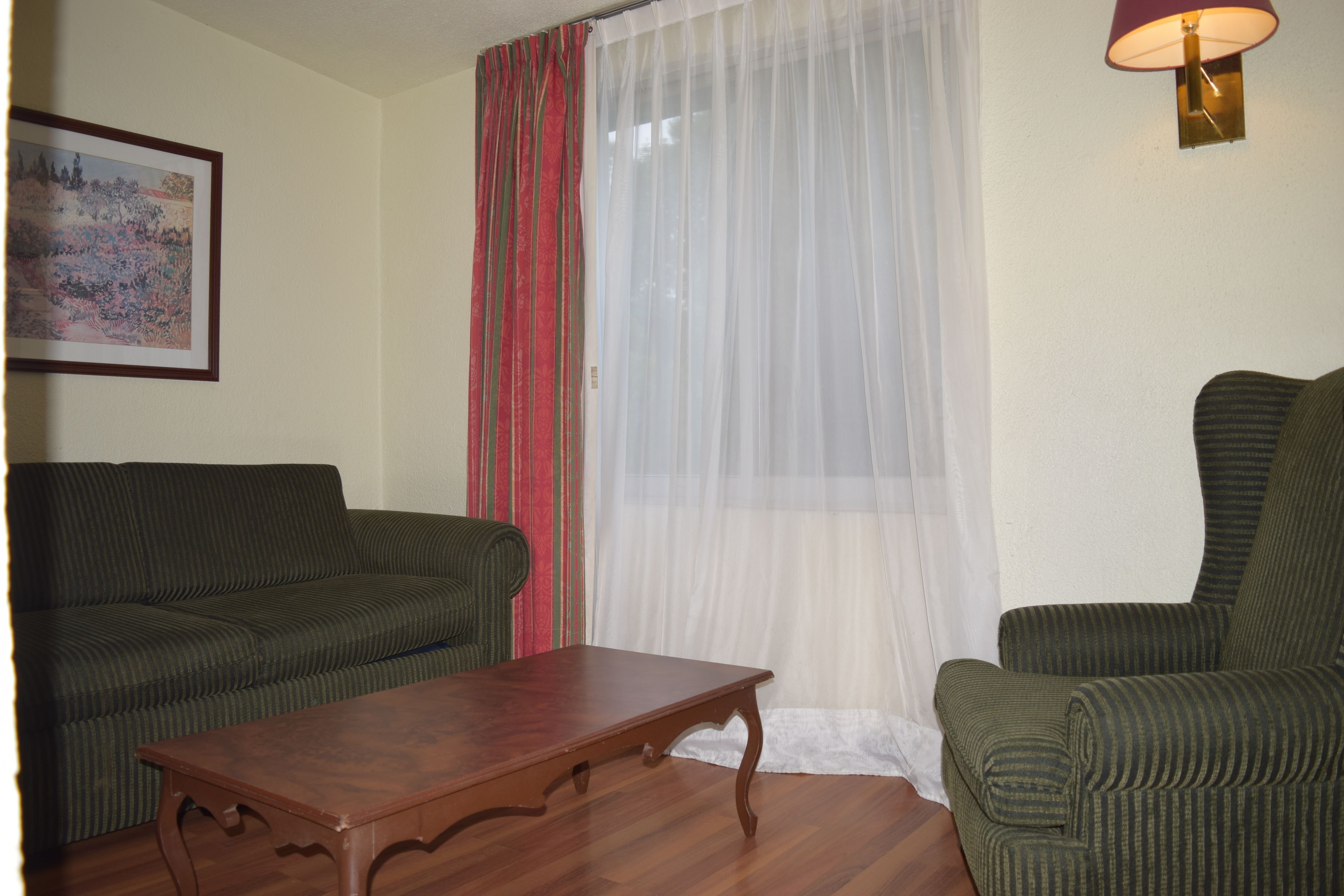 junior suite, 2 double beds | in-room safe, desk, laptop workspace, iron/ironing board