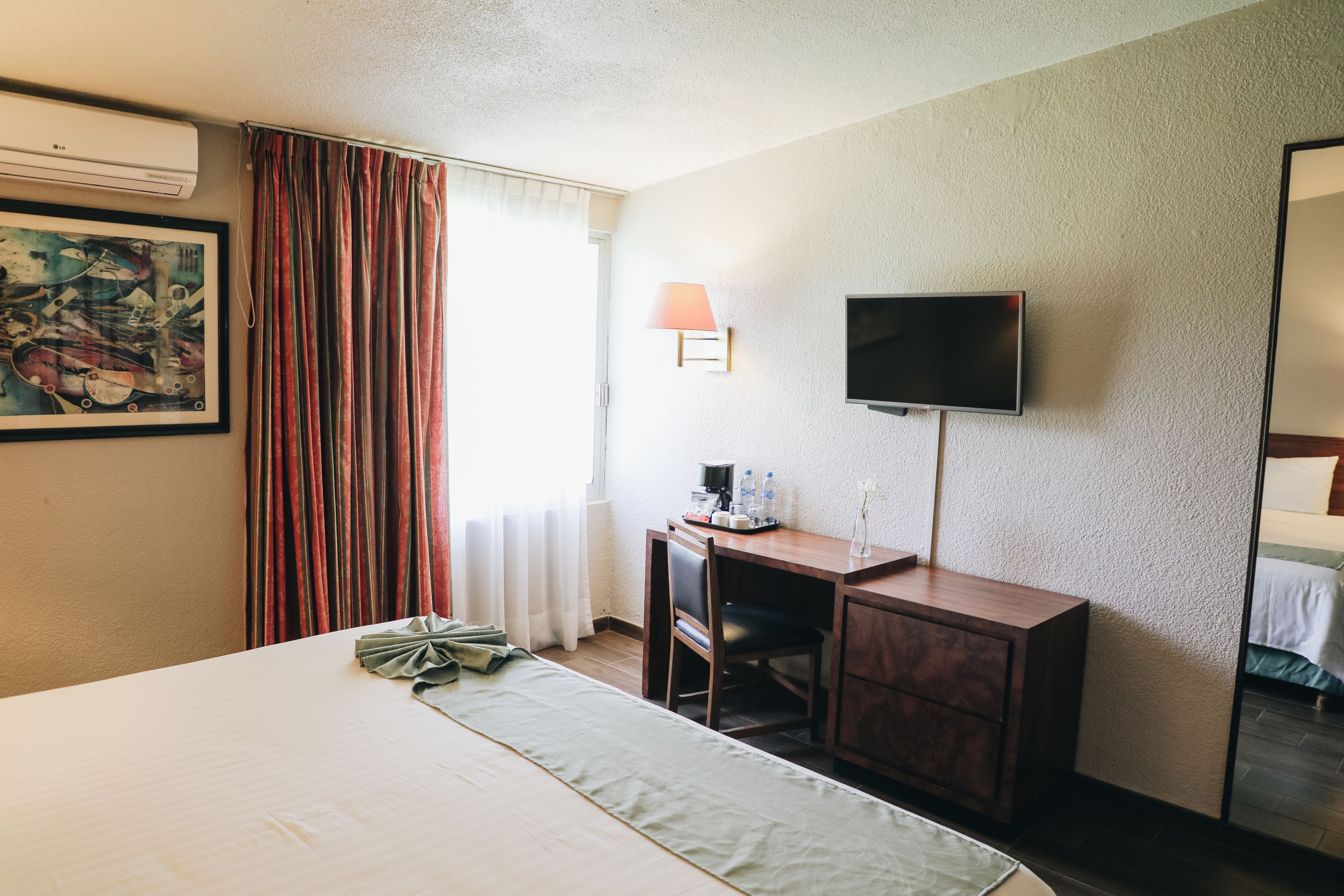 junior suite, 1 king bed | in-room safe, desk, laptop workspace, iron/ironing board