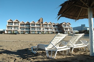On the beach, sun loungers, beach umbrellas, beach towels