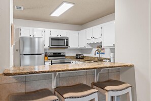 Condo | Private kitchen | Fridge, microwave, oven, stovetop - Woodland Shores Beach Resort by Panhandle Getaways (Miramar Beach)
