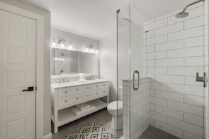 Condo, 2 Bedrooms | Bathroom | Combined shower/bathtub, deep-soaking bathtub, towels, shampoo