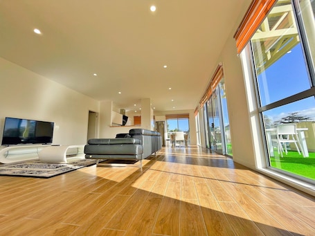 Executive Apartment, 3 Bedrooms, Balcony | Living area | Flat-screen TV