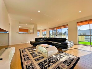 Executive Apartment, 3 Bedrooms, Balcony | Living area | Flat-screen TV