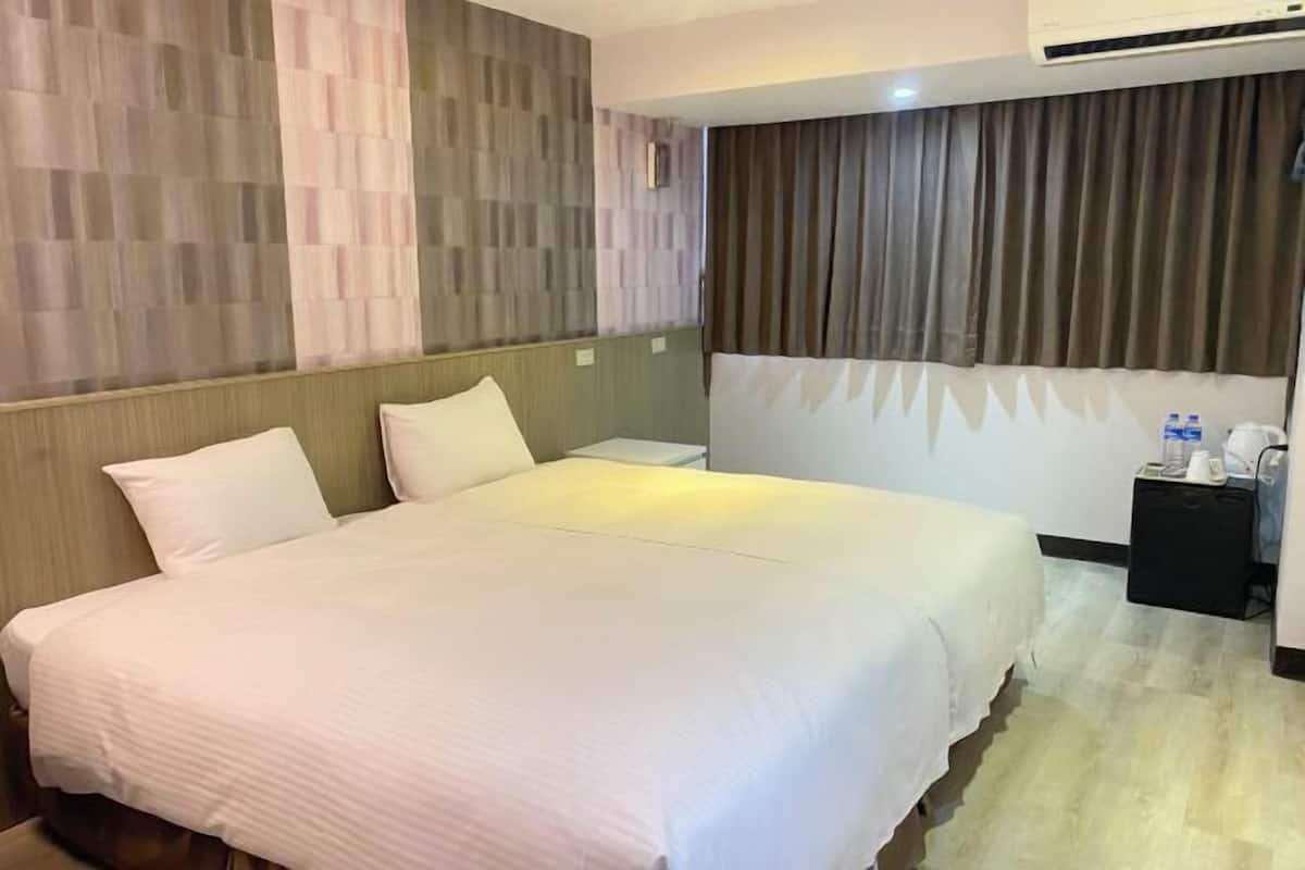 Down comforters, desk, blackout drapes, soundproofing