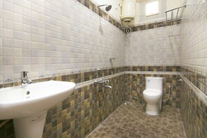 Executive Double Room (AC) | Bathroom | Shower, free toiletries, towels - Shoba Tulip (Bengaluru)
