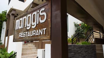 Breakfast, lunch, dinner served; local and international cuisine