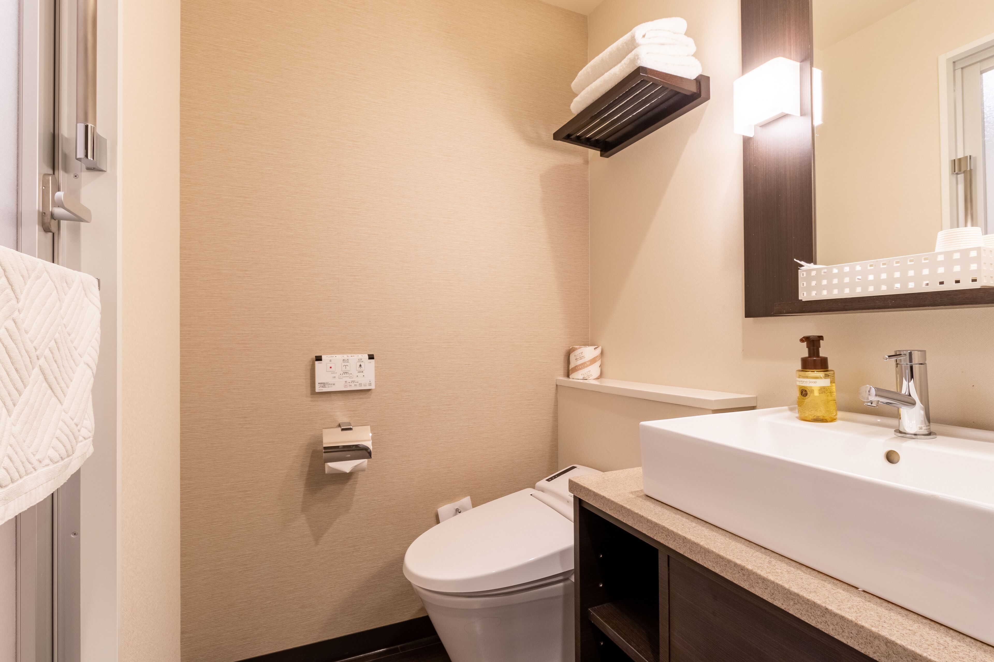 twin room with shower booth, non smoking | bathroom | free toiletries, hair dryer, slippers, bidet
