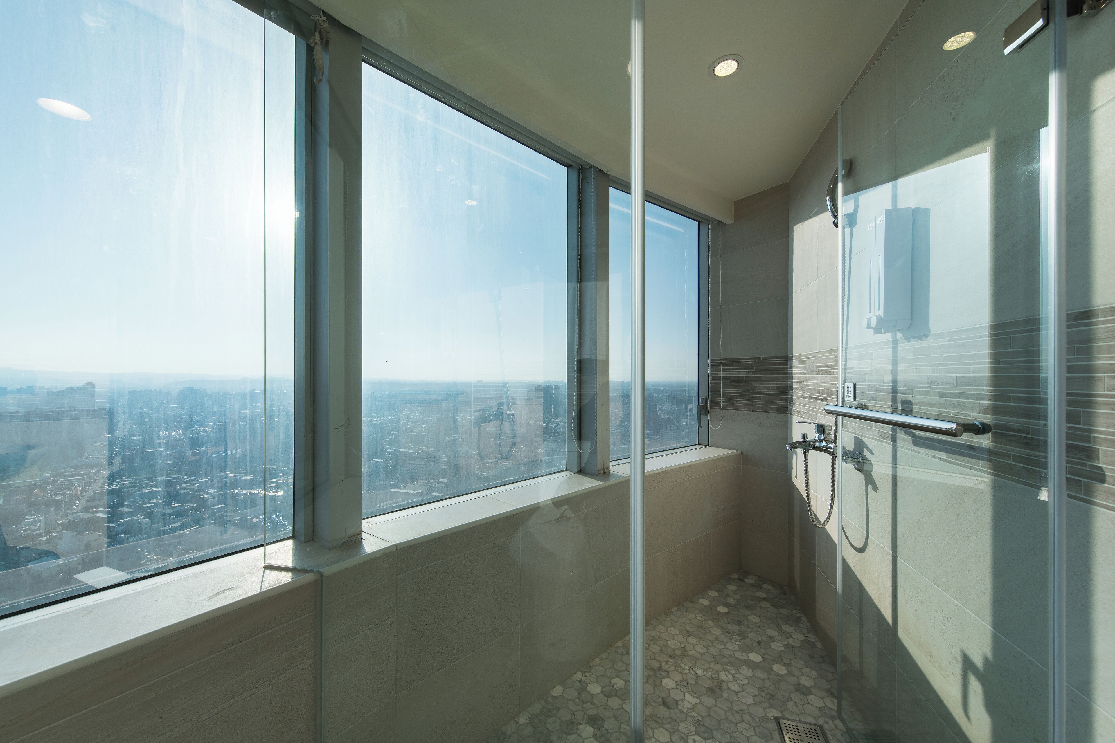 deluxe double room, 1 queen bed, city view, tower (not applicable for travel subsidies) | bathroom | shower, rainfall showerhead, hair dryer, slippers